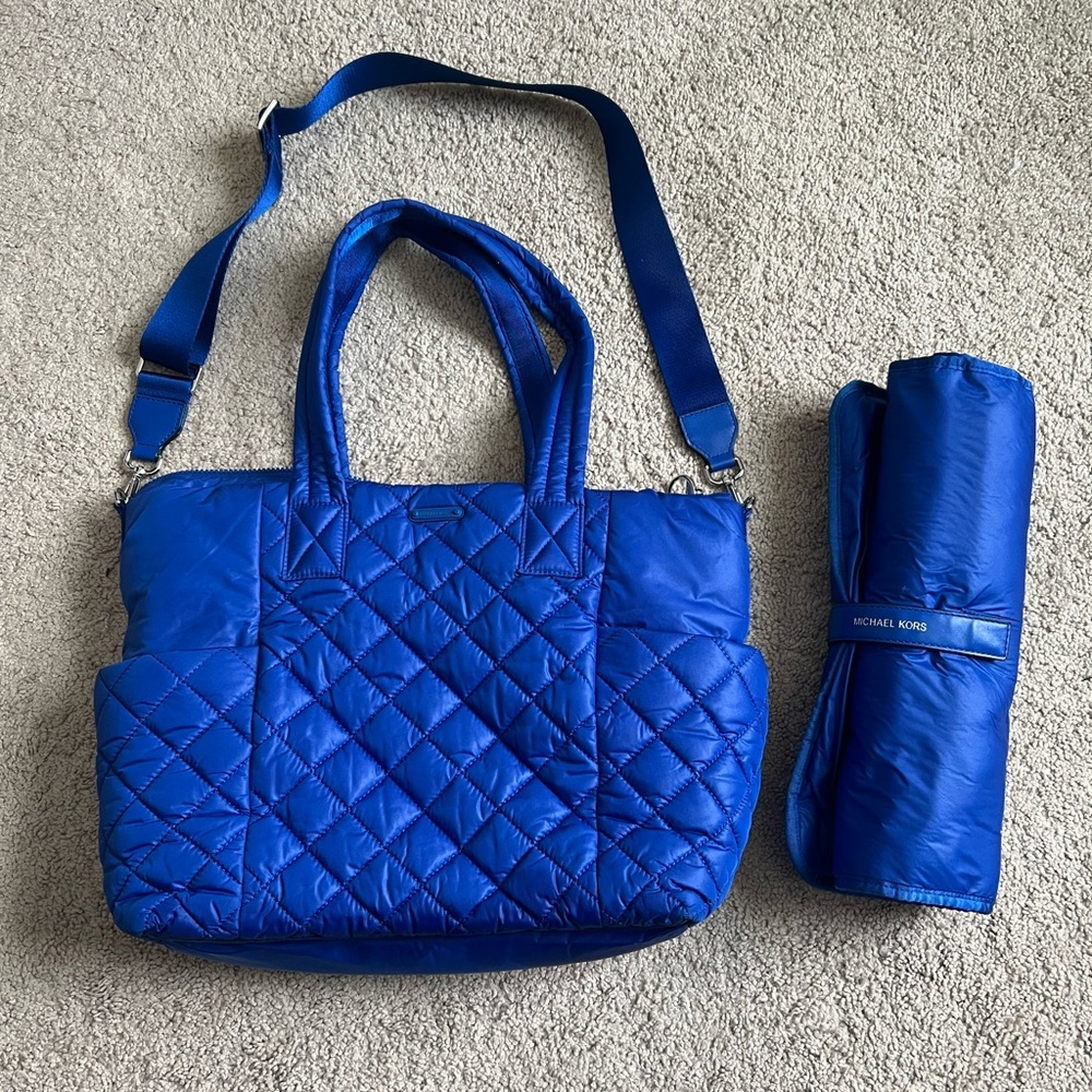 Michael Kors diaper bag with changing pad.